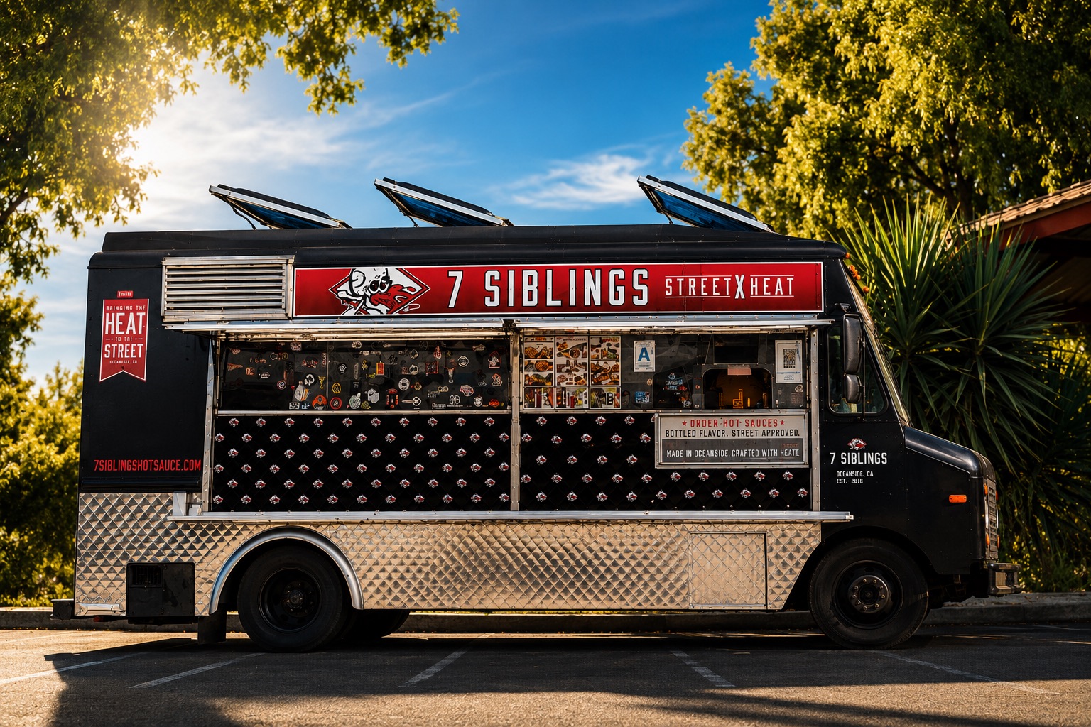 The 7 Siblings Street x Heat food truck parked under the trees